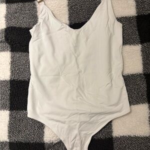 Babaton White Bodysuit with Spaghetti Straps and Fitted Silhouette
